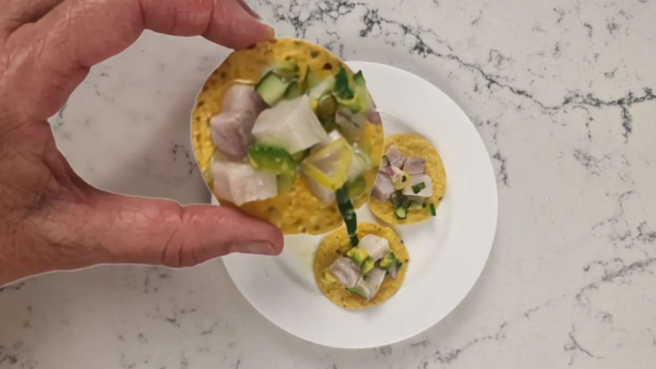 Serve lemon drop chilli kingfish ceviche on corn chips or tostadas